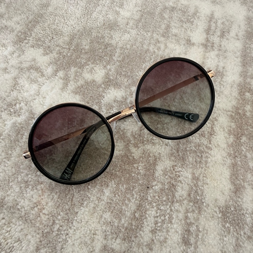 Round Black Sunglasses with Gold Accents